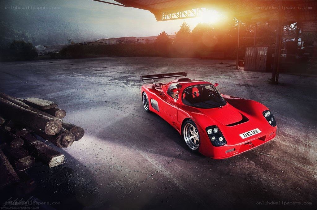 Red race car at sunset