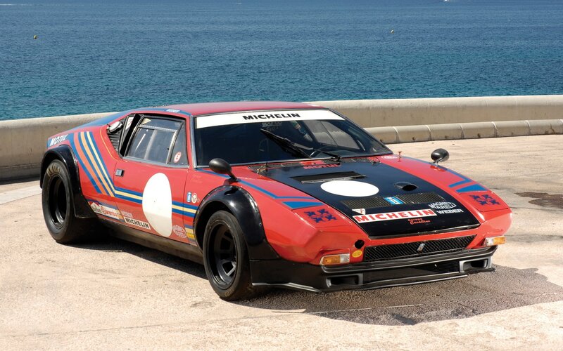 Red race car by the sea