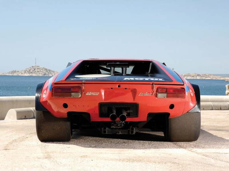 red race car by the sea