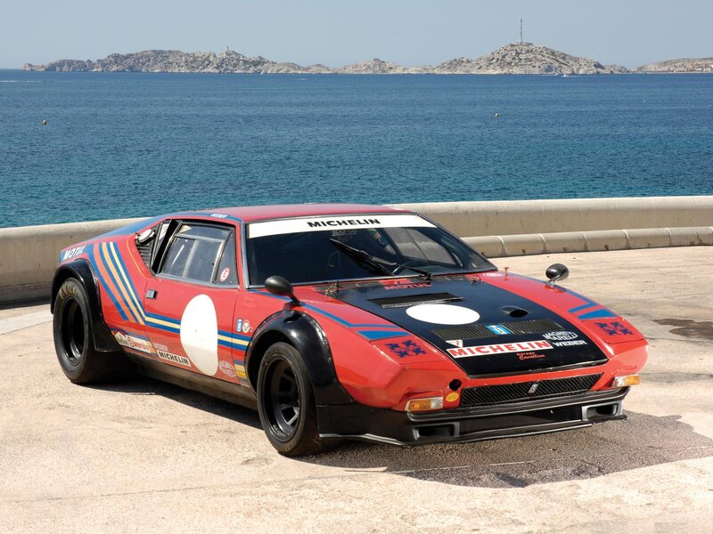 Red race car by the sea