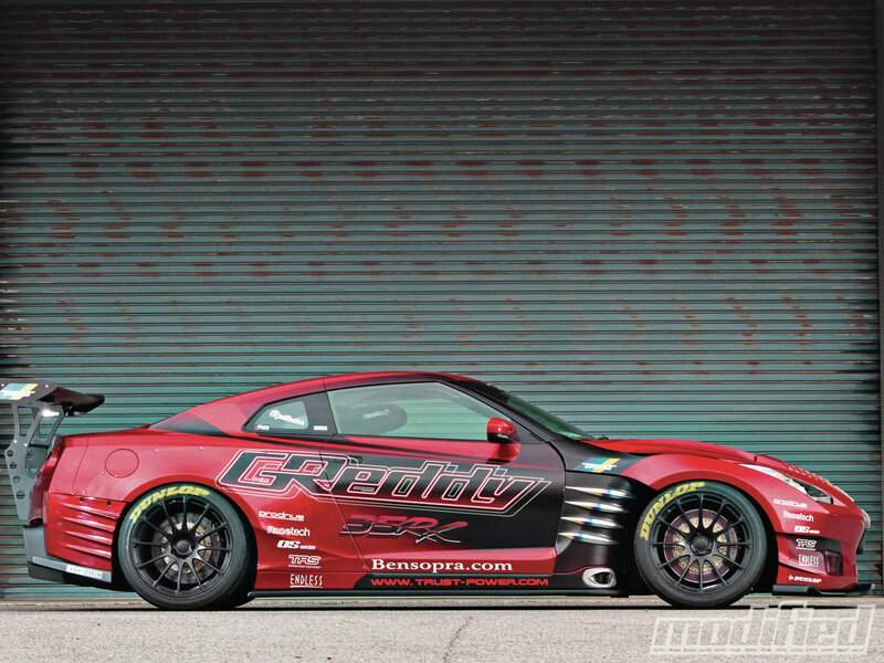 Red Race Car — Dramatic, Photograph, Garage Door