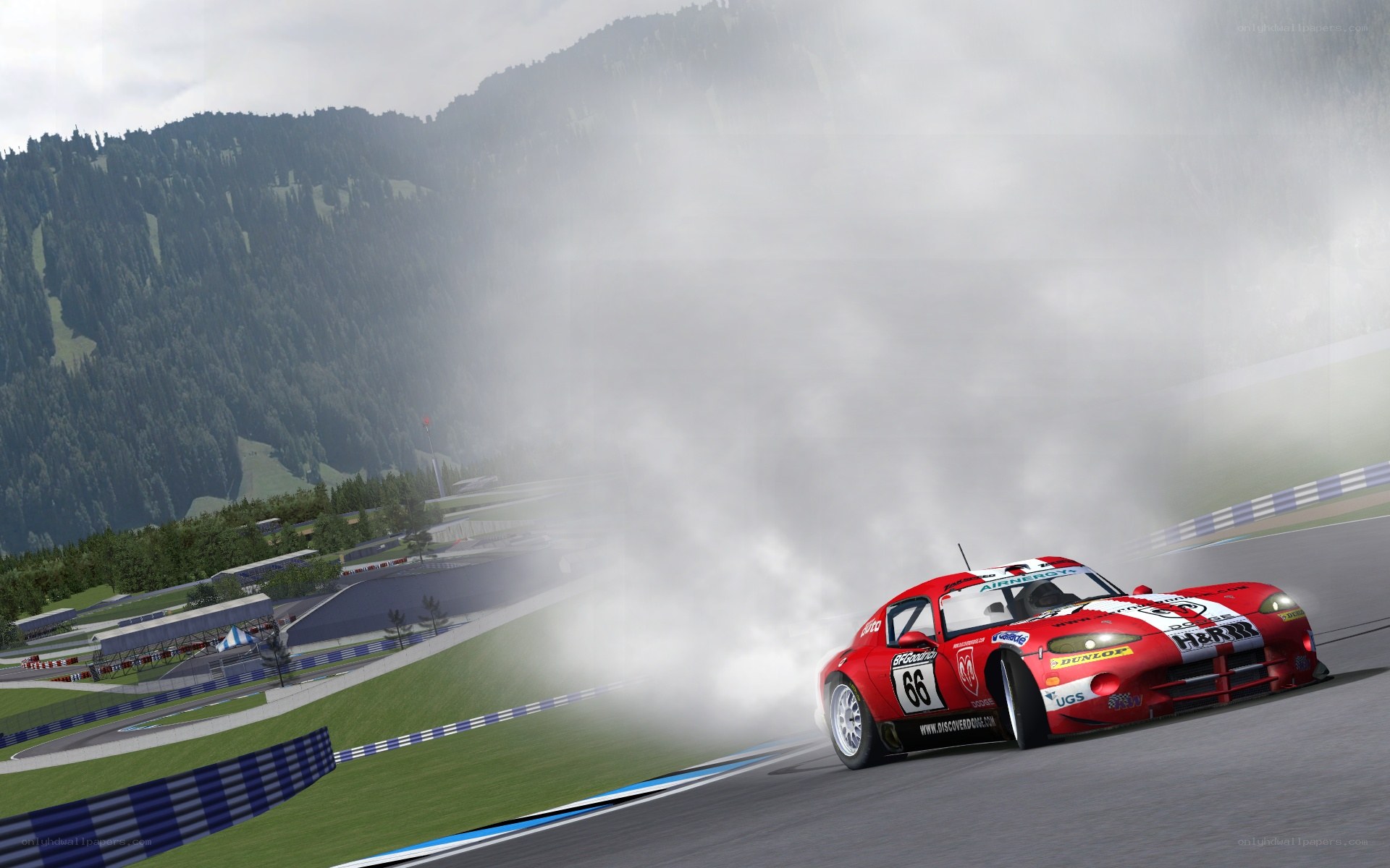 Red race car drifting on track