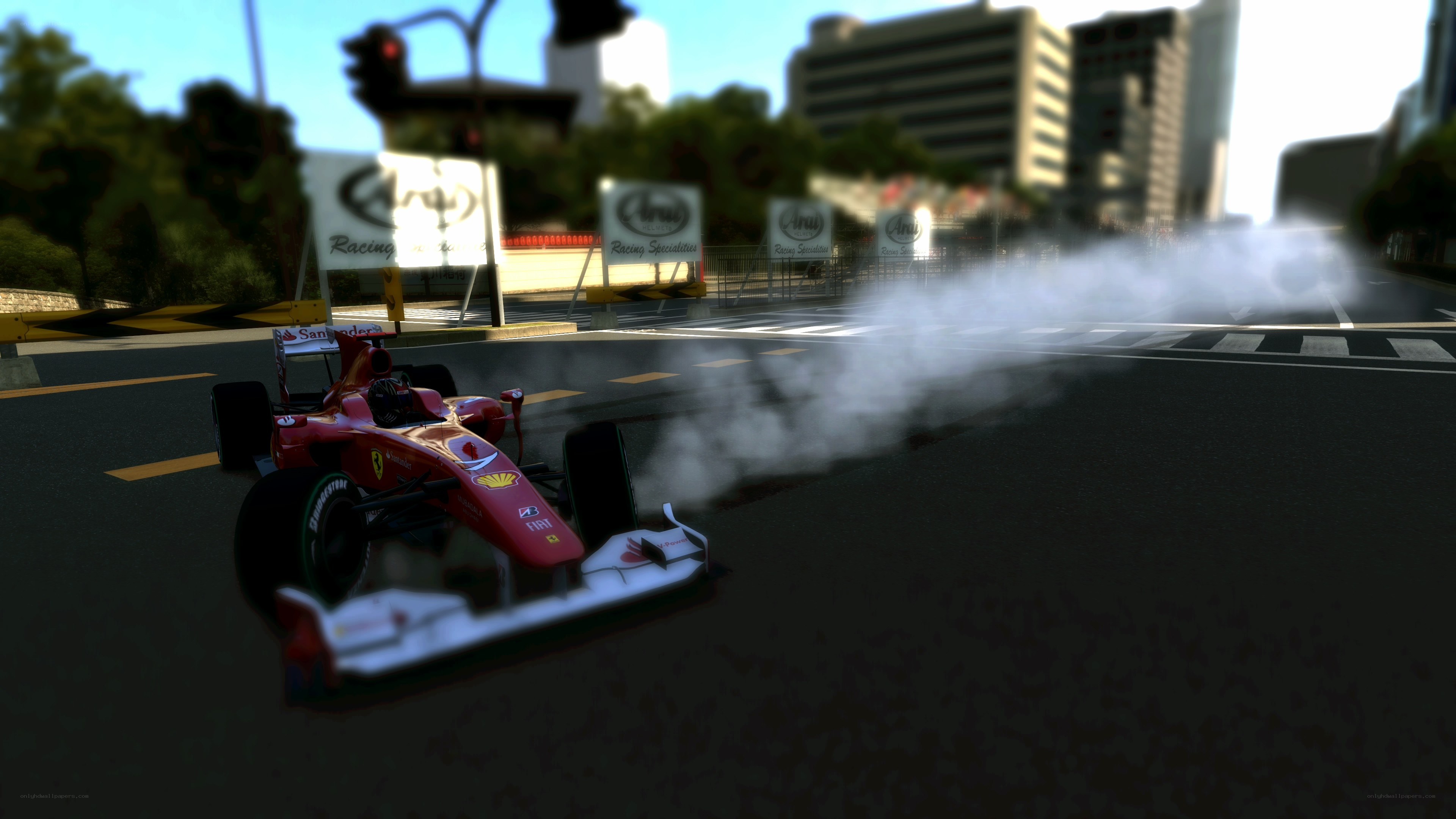 Red race car drifting on track