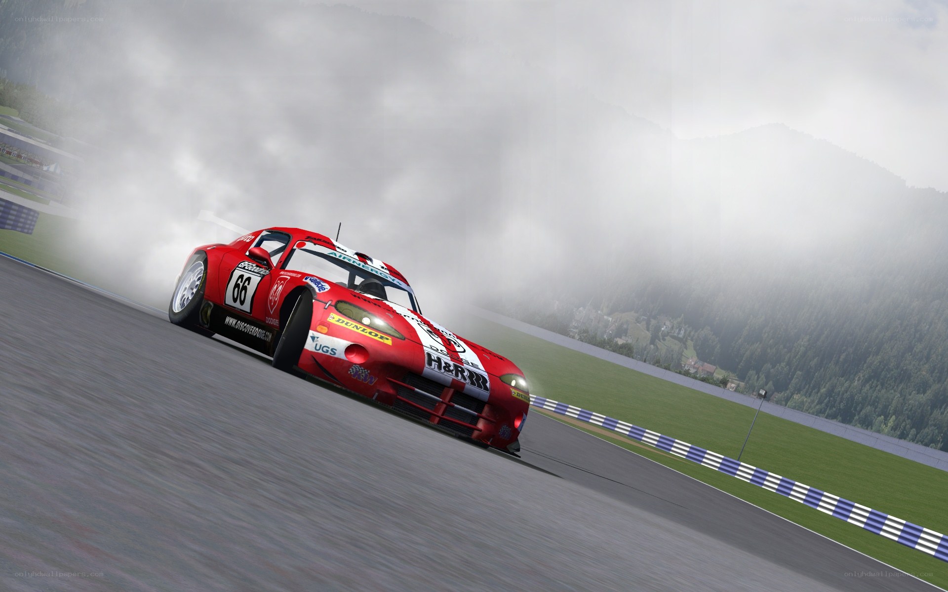 Red race car drifting on track