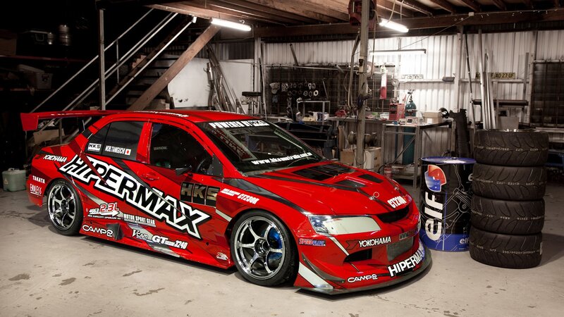 red race car in garage
