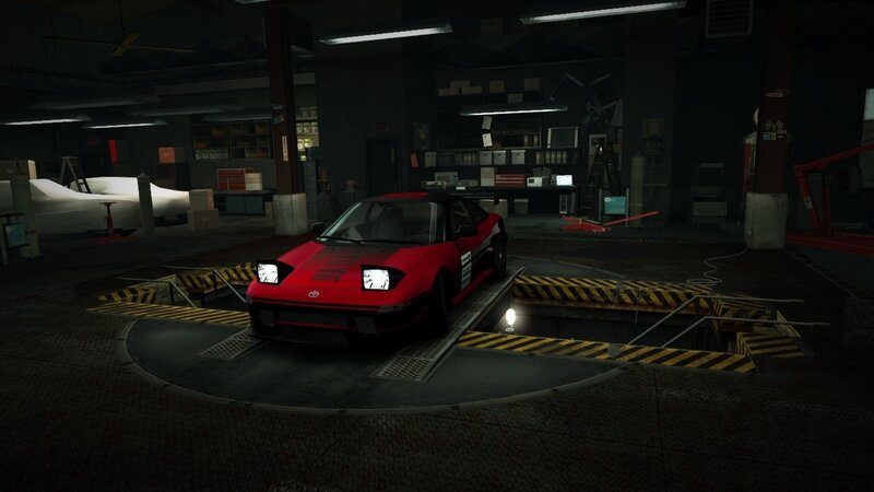 red race car in garage