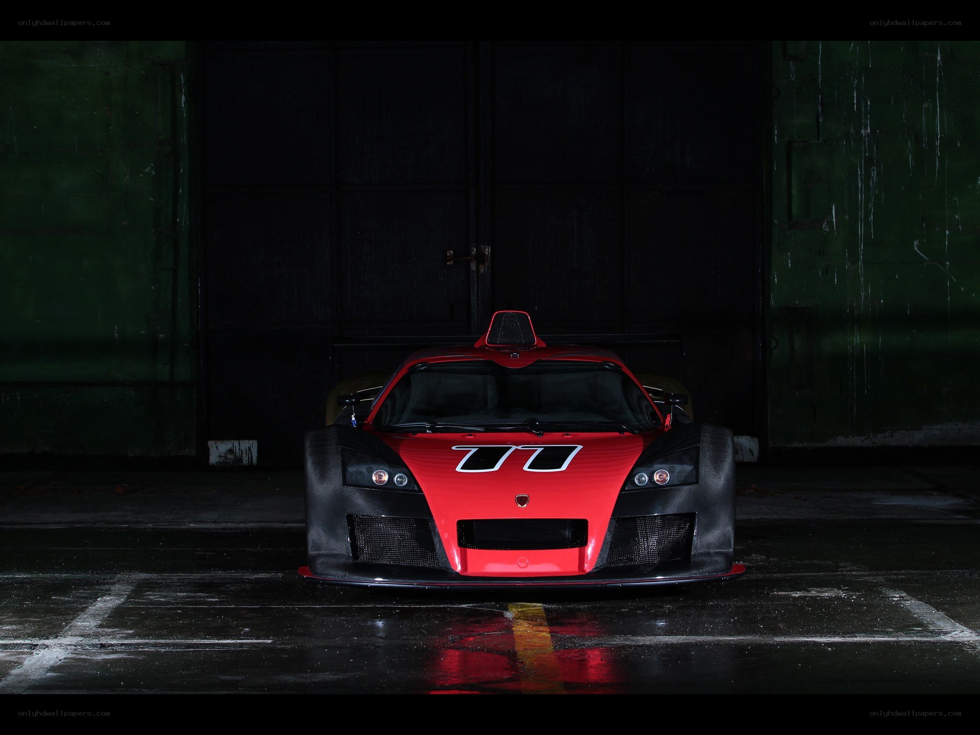 Red race car in garage