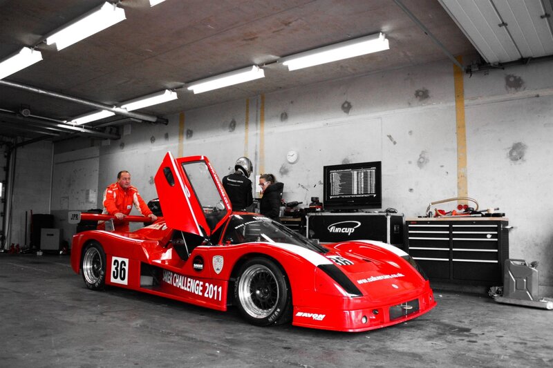Red Race Car in Garage — Focused