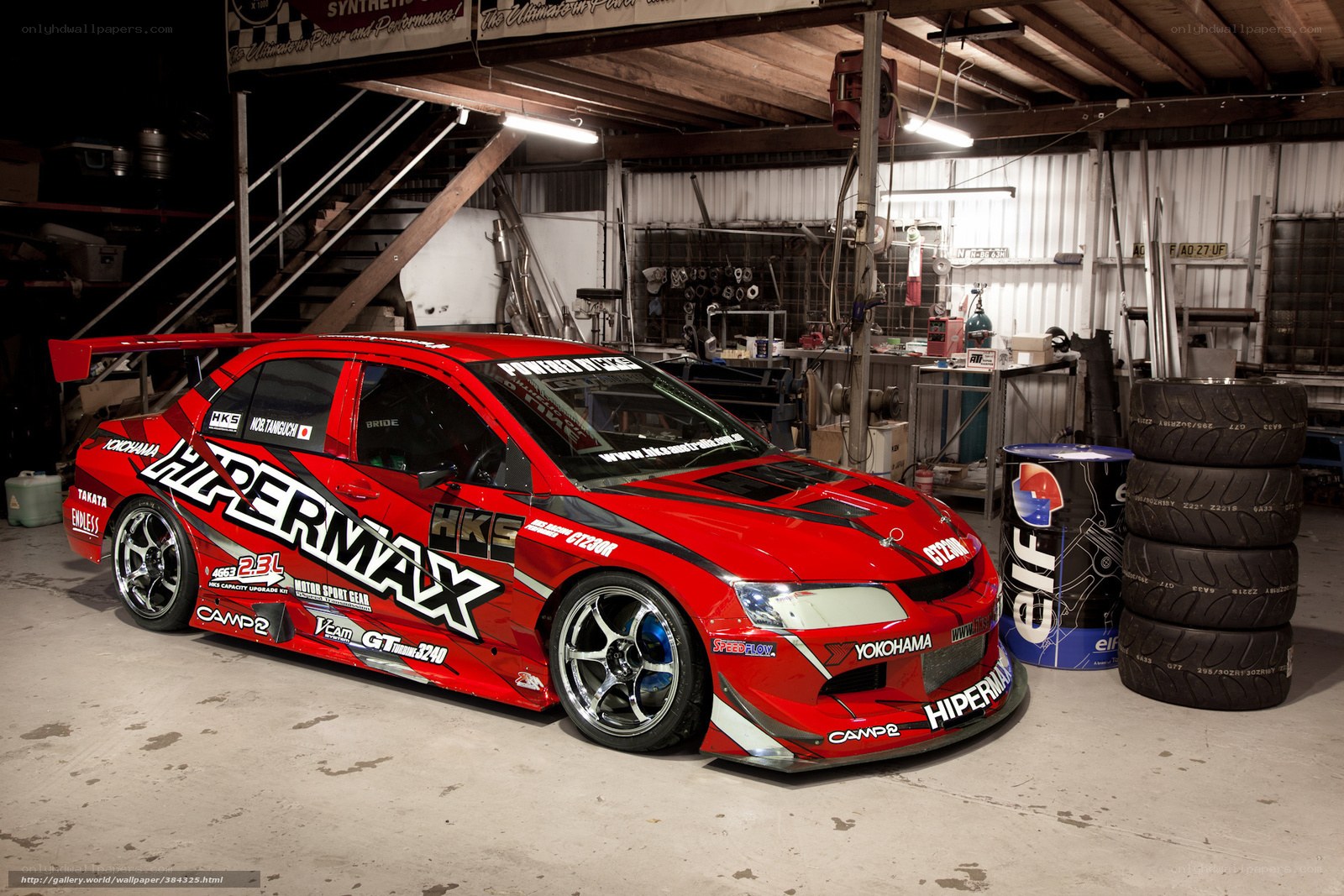 red race car in garage