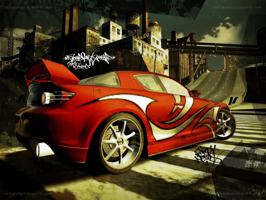 Red race car in industrial setting