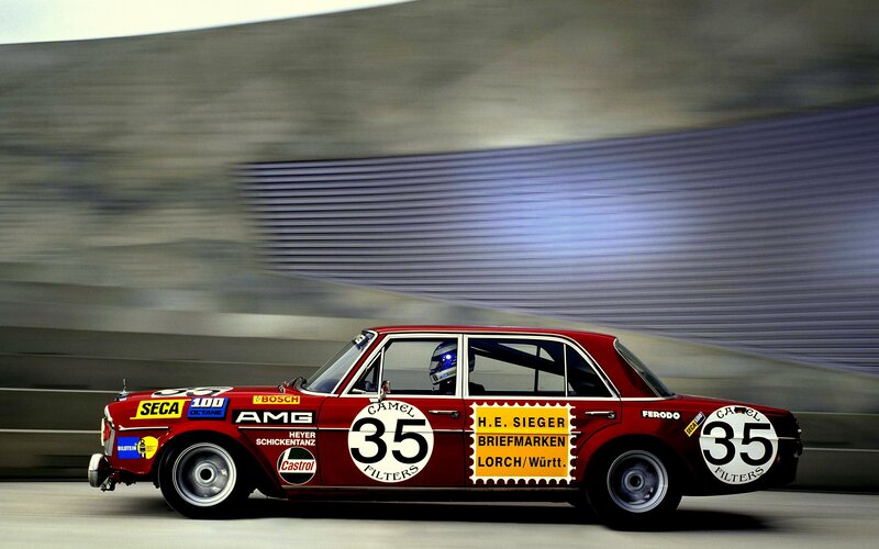 Red race car in motion