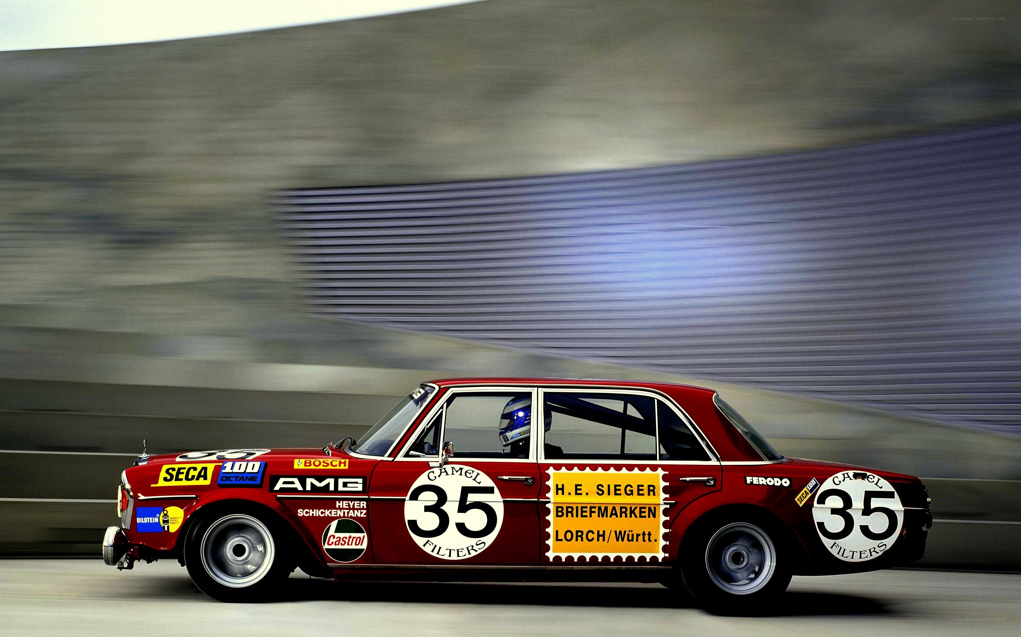 Red race car in motion