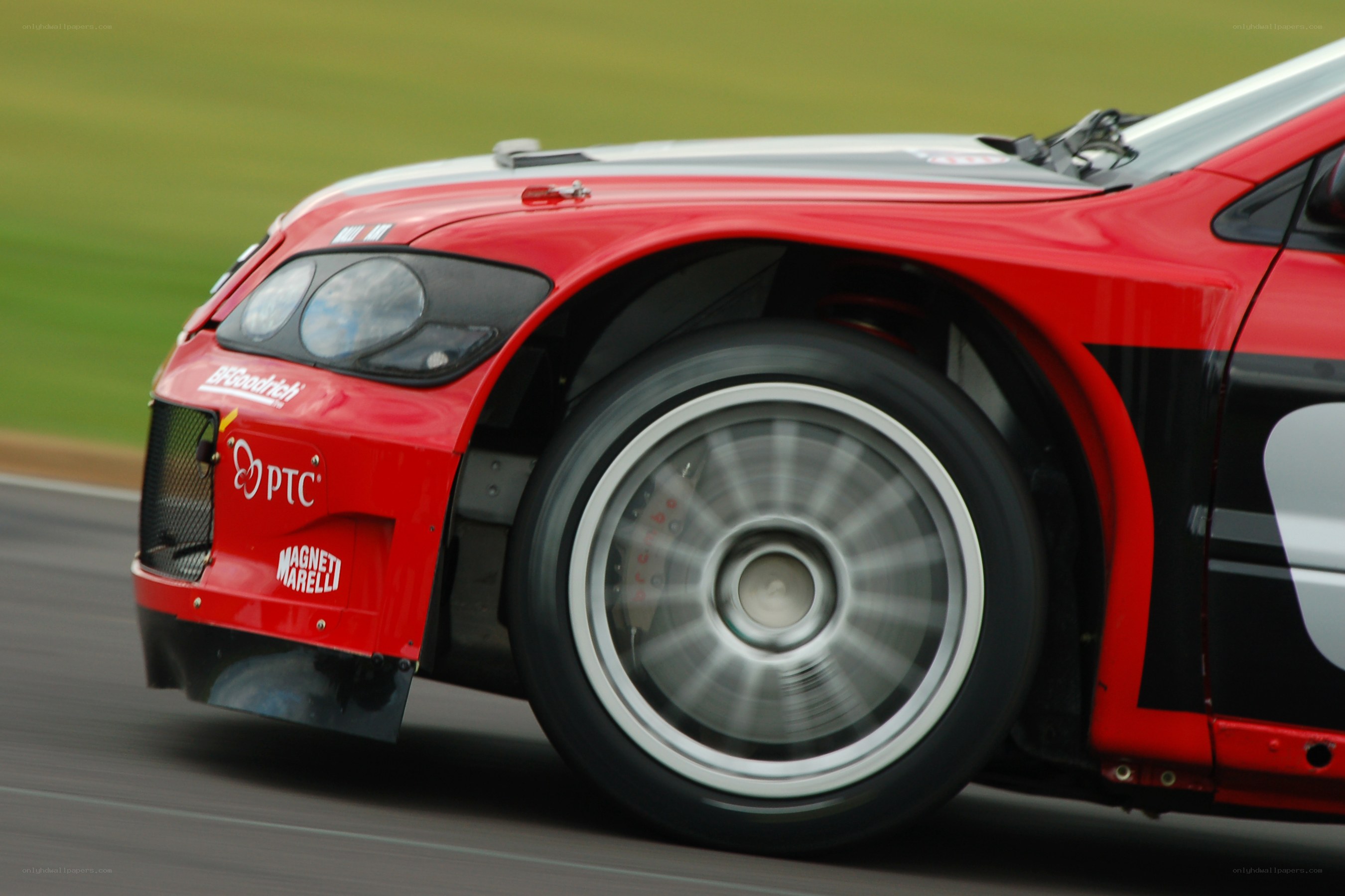 red race car in motion