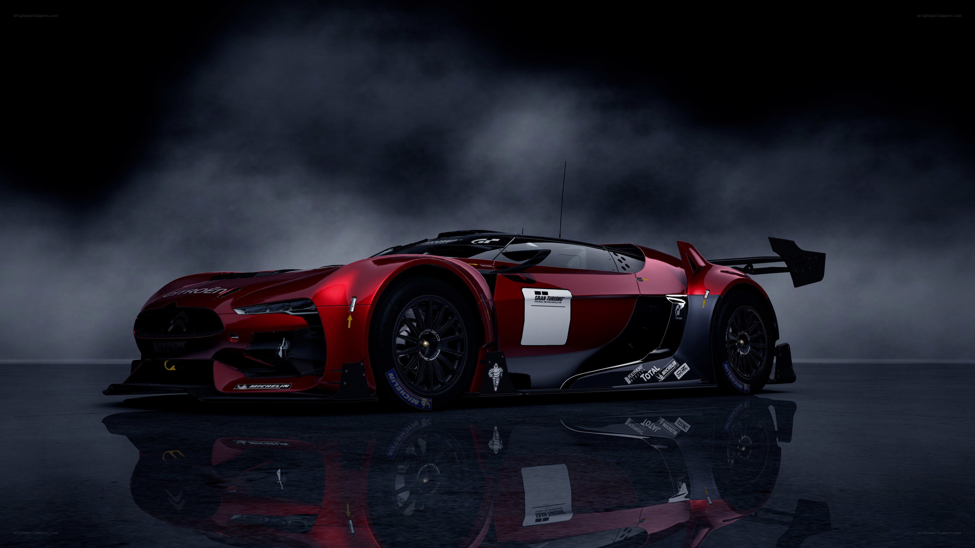 red race car in smoke