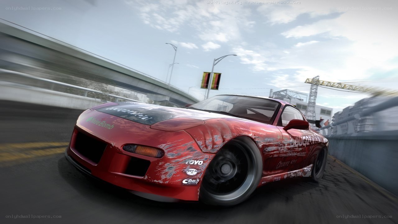 red race car on a bridge