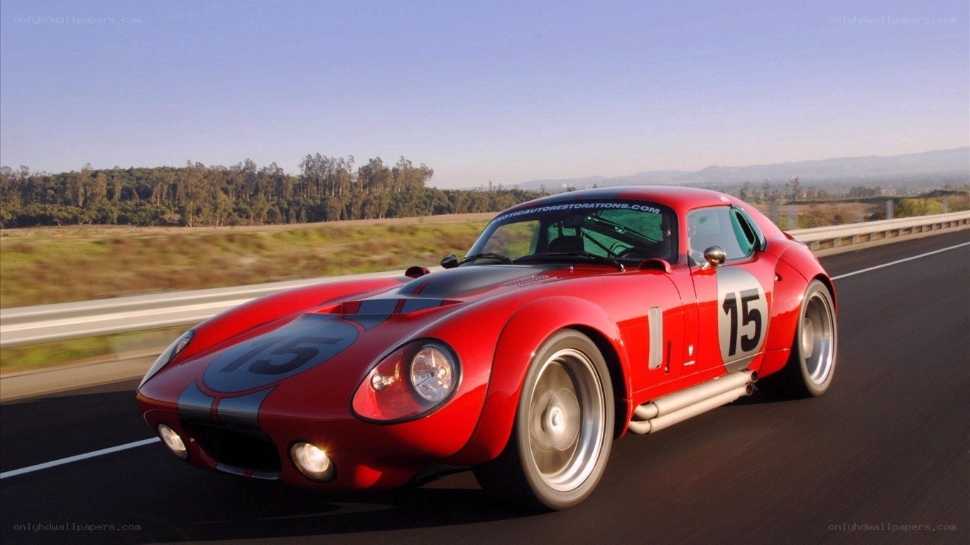 Red race car on a highway