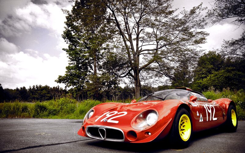 Red race car on a road