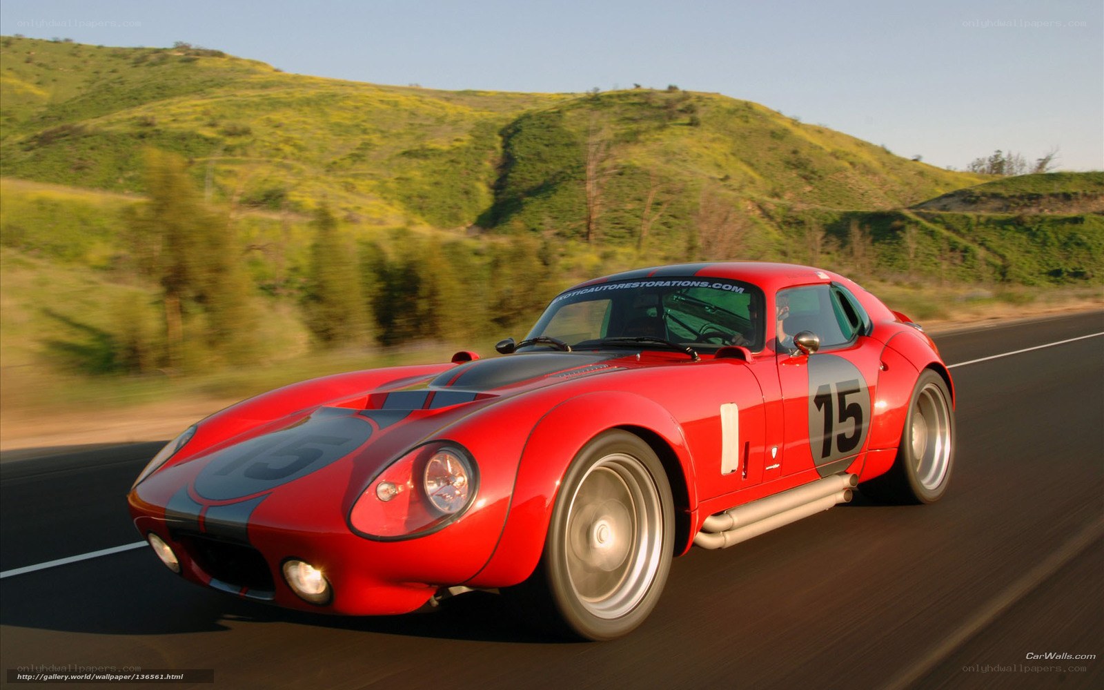 Red race car on a road