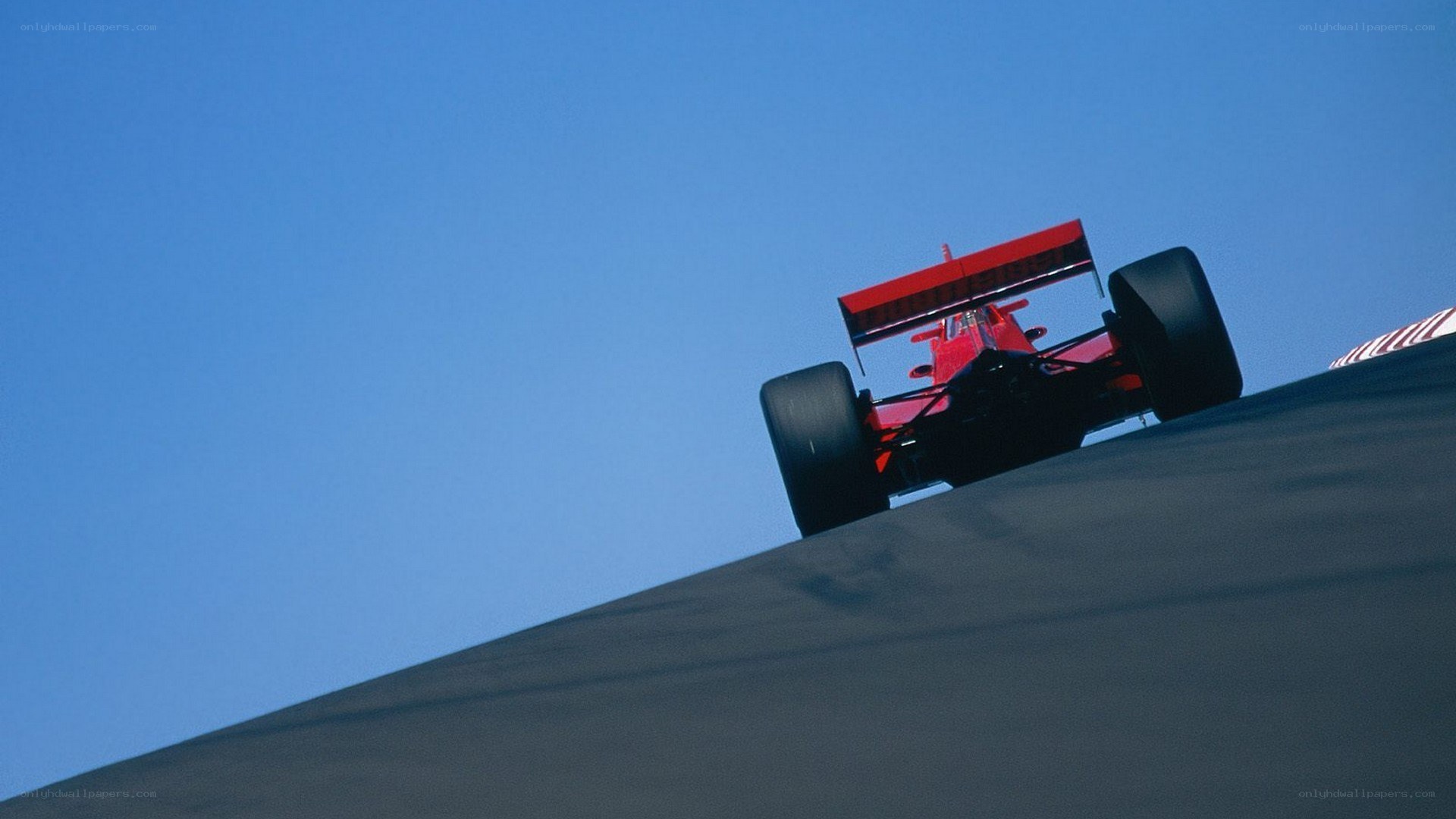 Red race car on a track