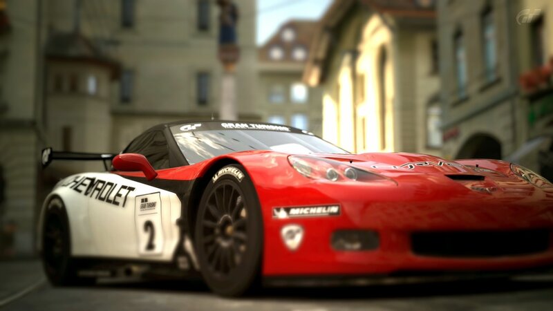 red race car on city street