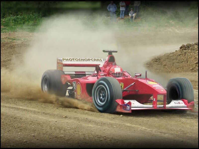 Red race car on dirt track