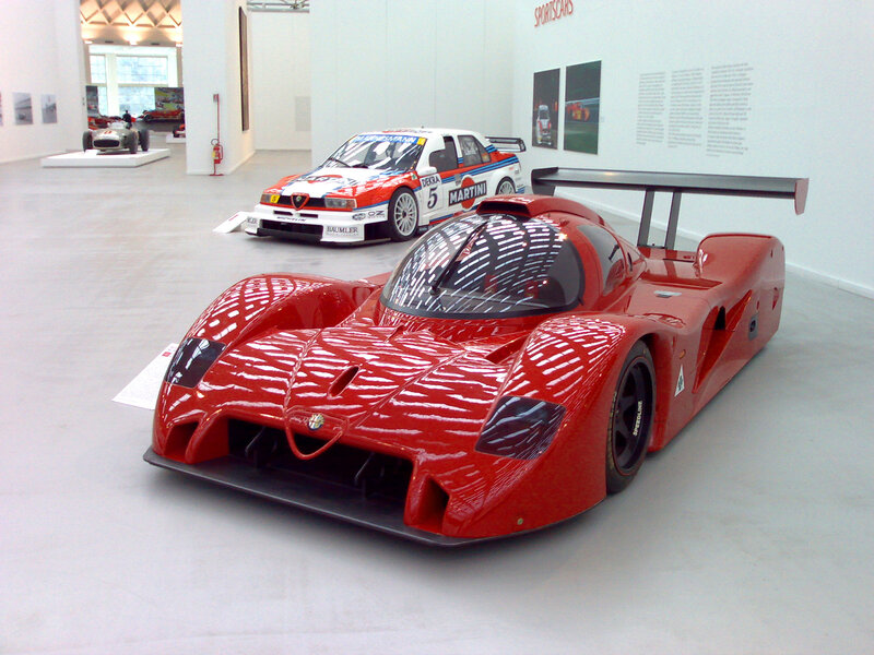 Red race car on display
