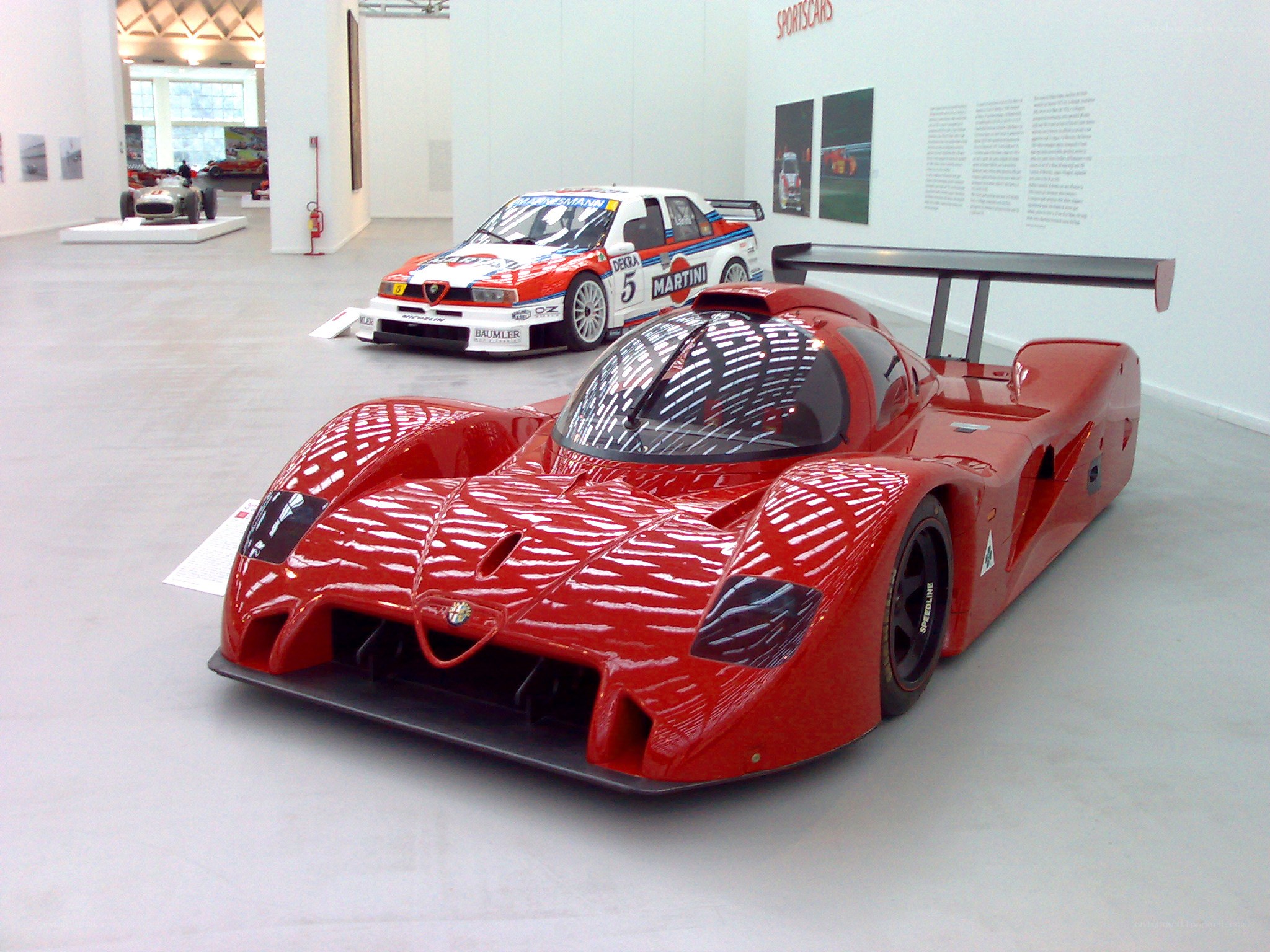Red race car on display