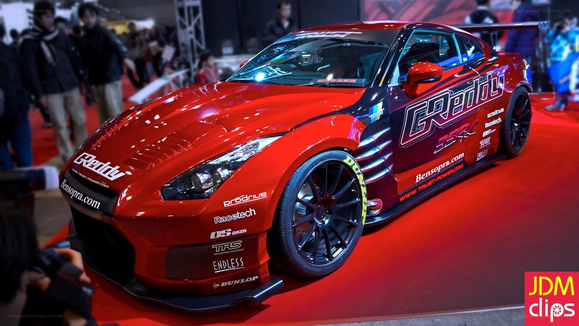 Red race car on display