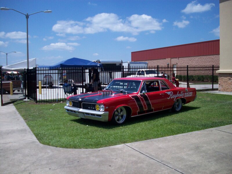 Red Race Car on Grass