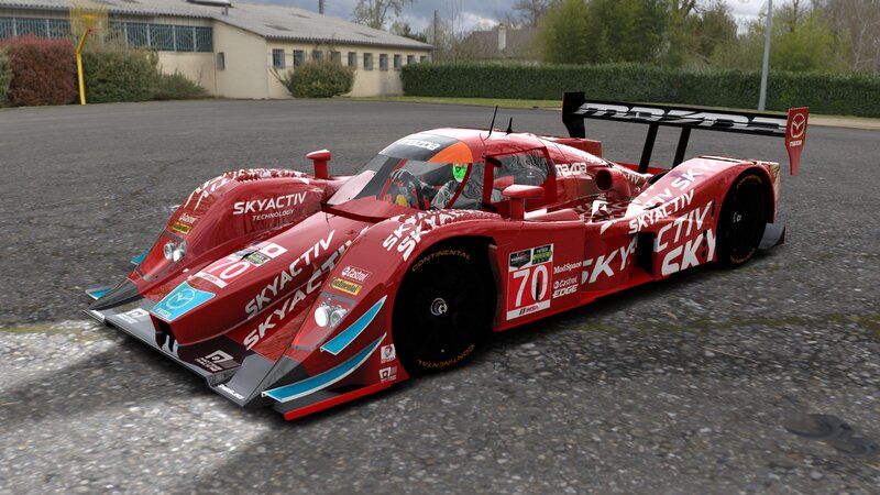 Red Race Car on Pavement