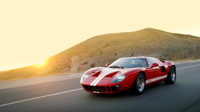 Red Race Car on Road — Dramatic, Sunset, Photograph
