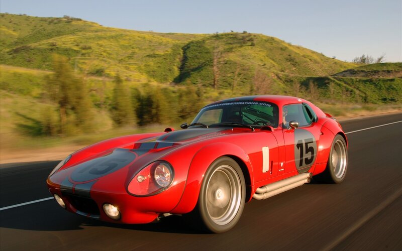 Red Race Car on Road — Dynamic, Afternoon, Photograph, Hills, Trees, Green