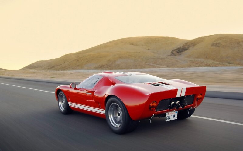 Red Race Car on Road — Dynamic, Sunset, Photograph