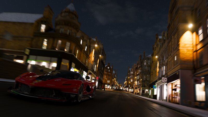 Red Race Car on Street — Dark
