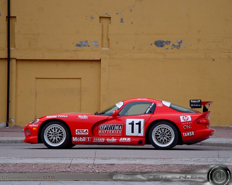 Red race car on street