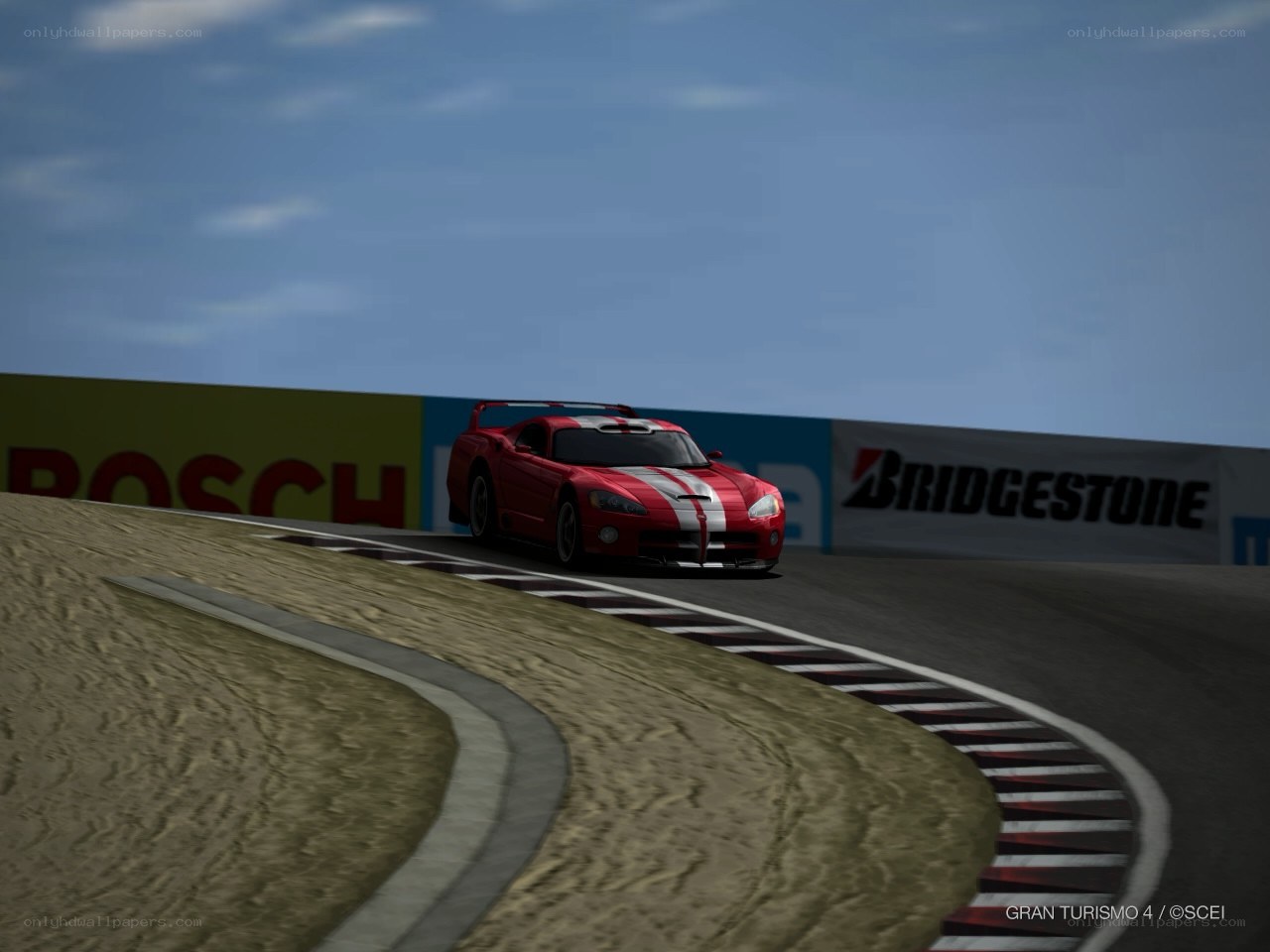Red race car on track