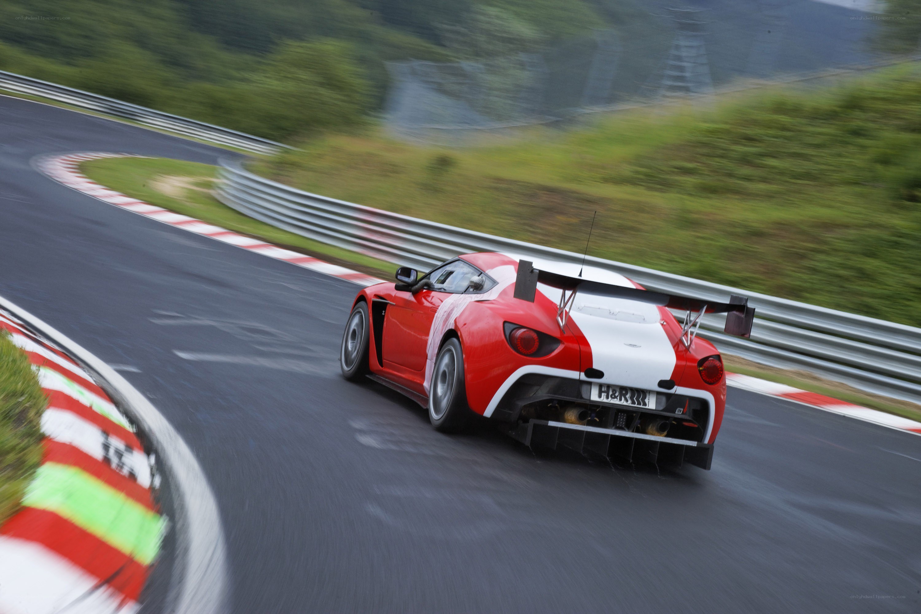 Red race car on track