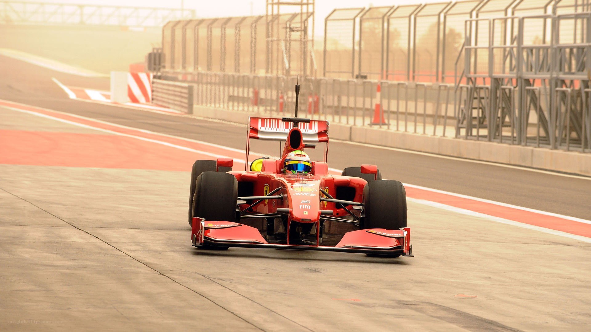 Red race car on track