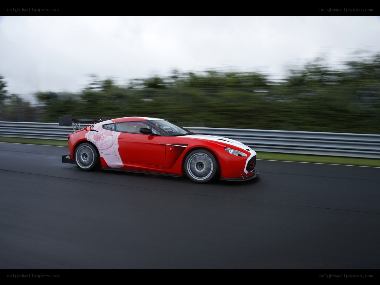 Red race car on track
