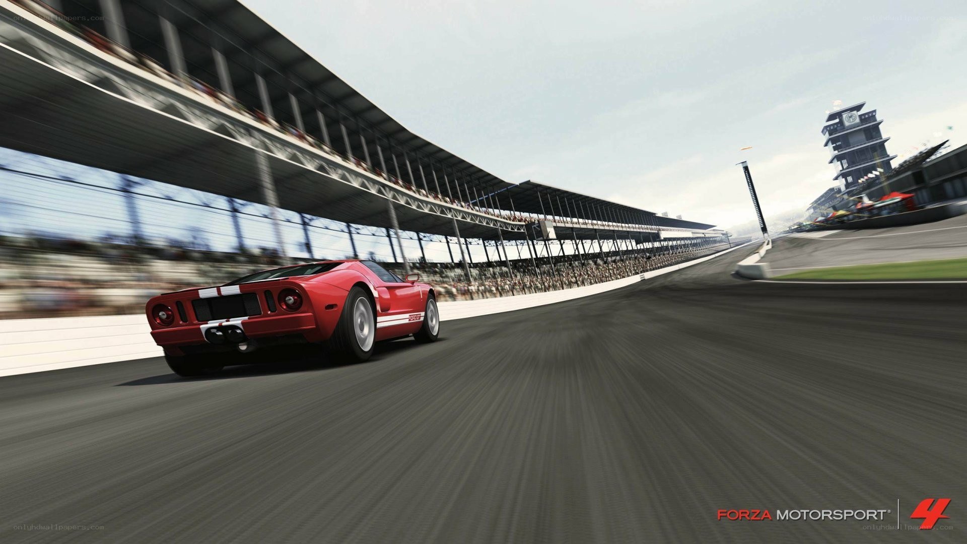 Red race car on track