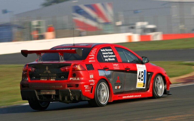 red race car on track