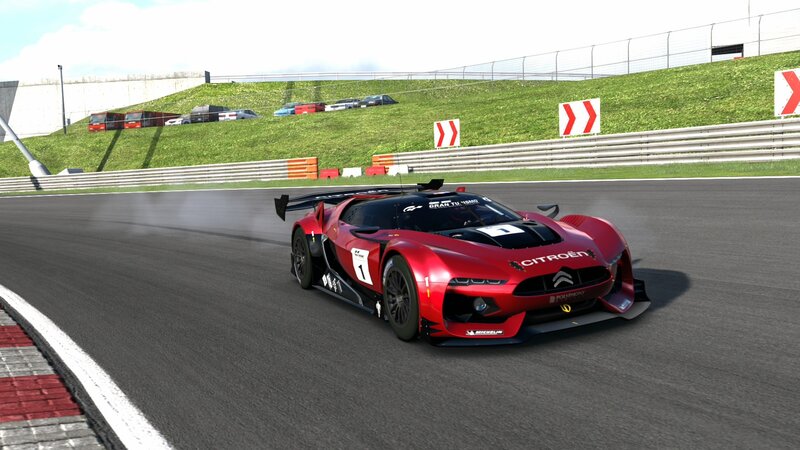 Red race car on track