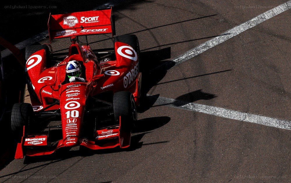 Red race car on track
