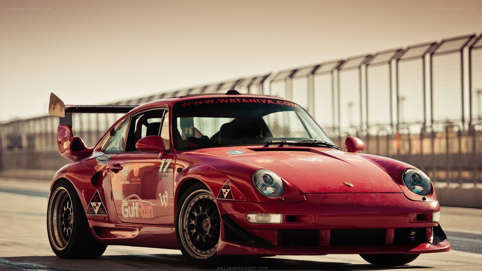 red race car on track