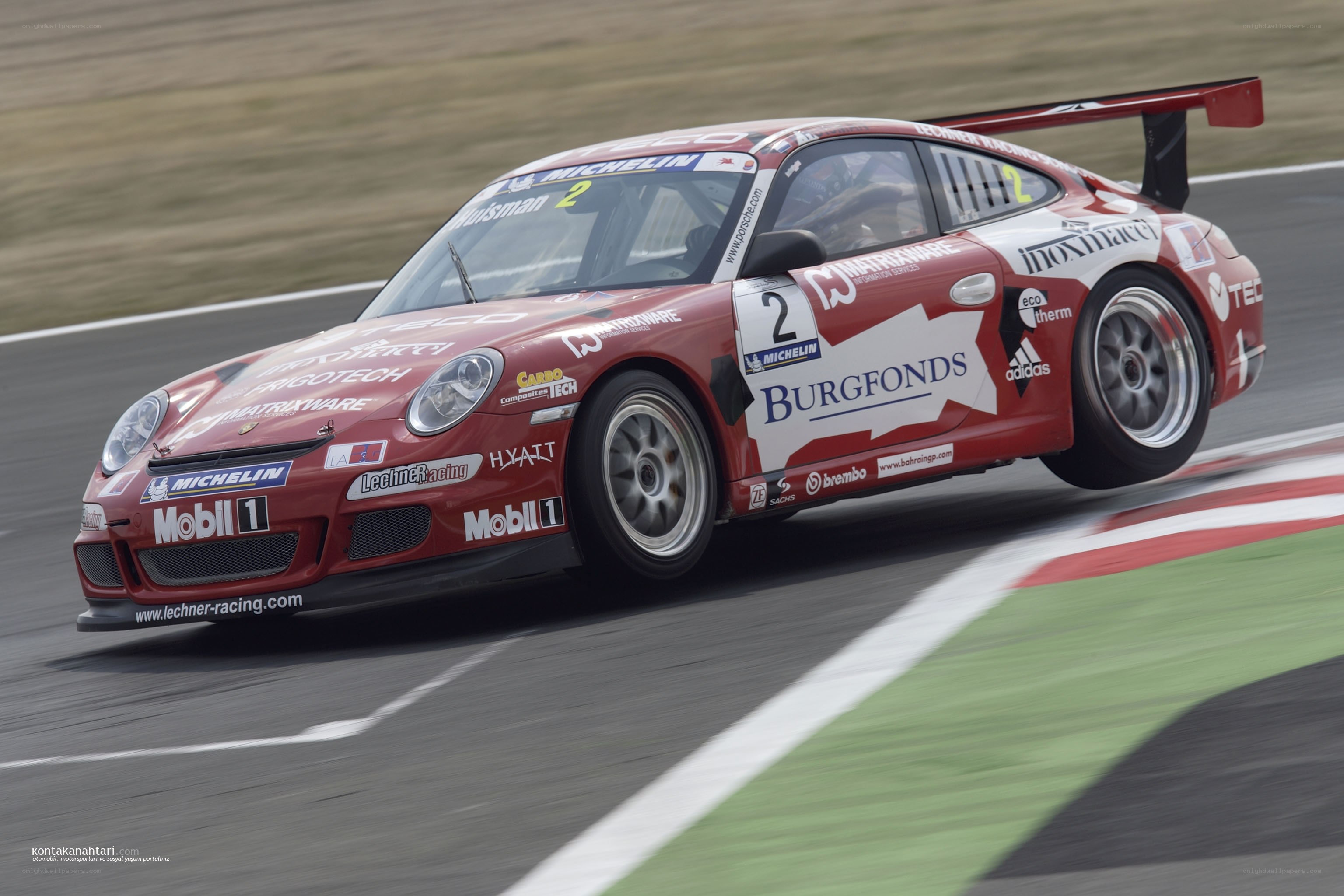 Red race car on track
