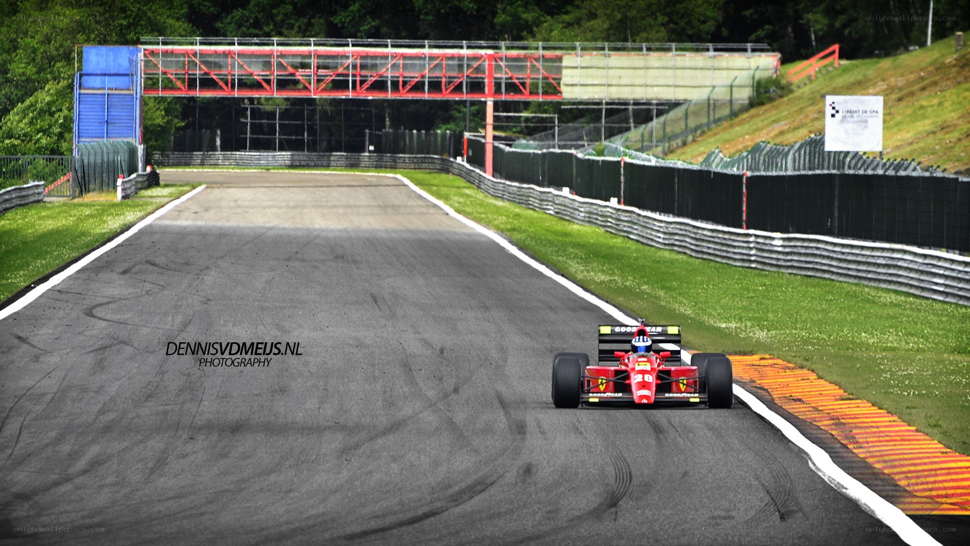 Red race car on track