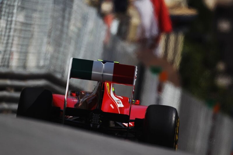Red race car on track