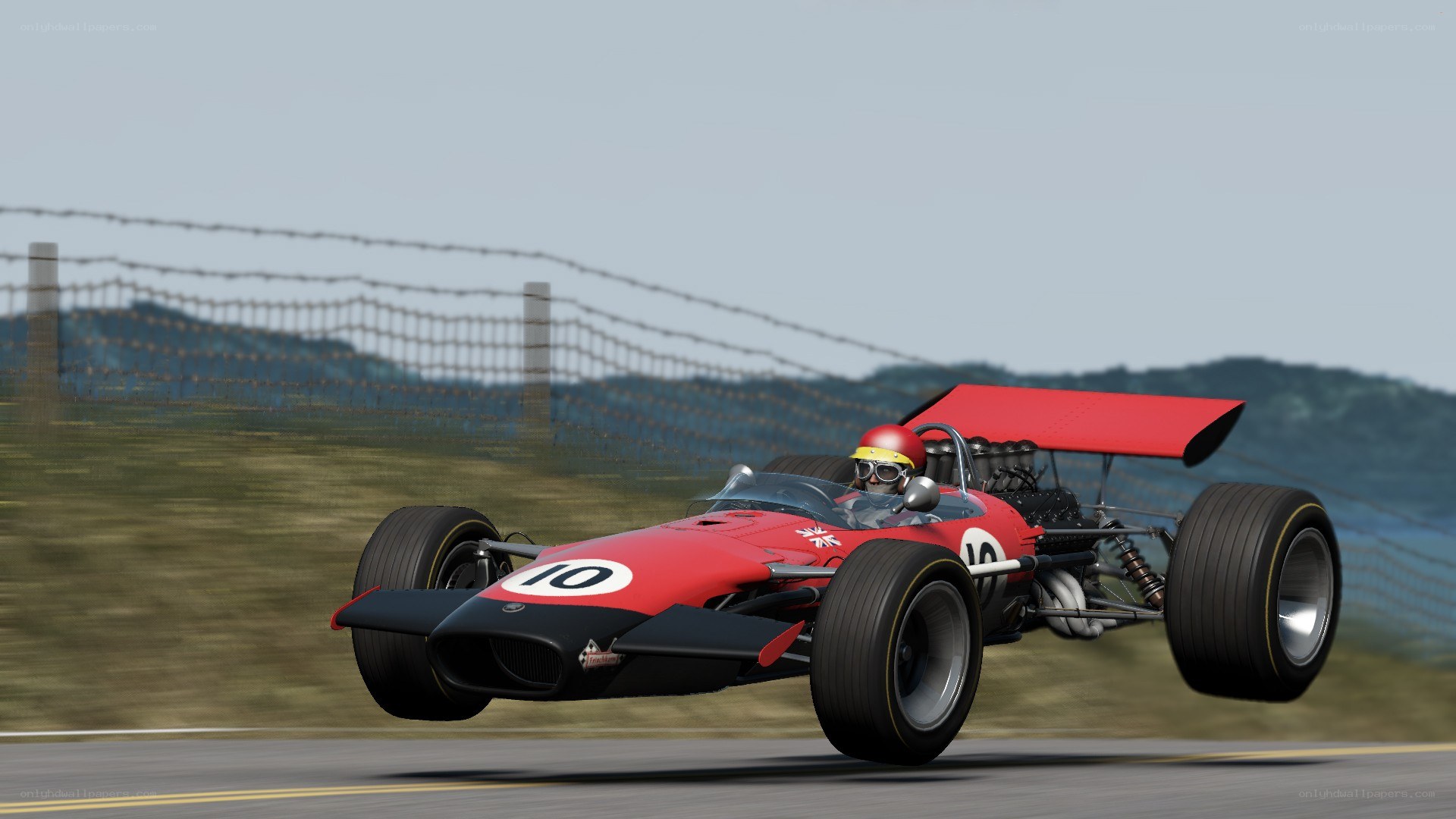 Red race car on track