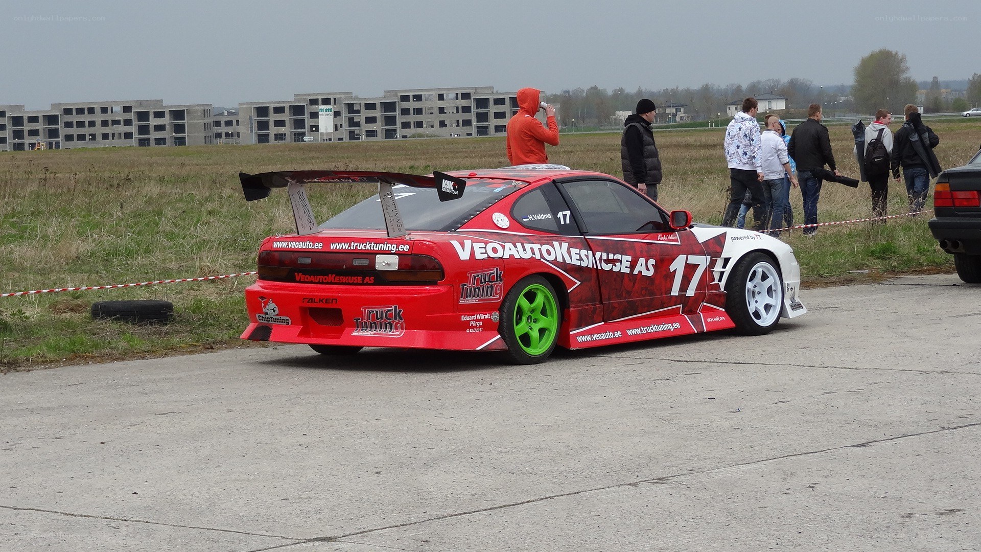 Red race car on track