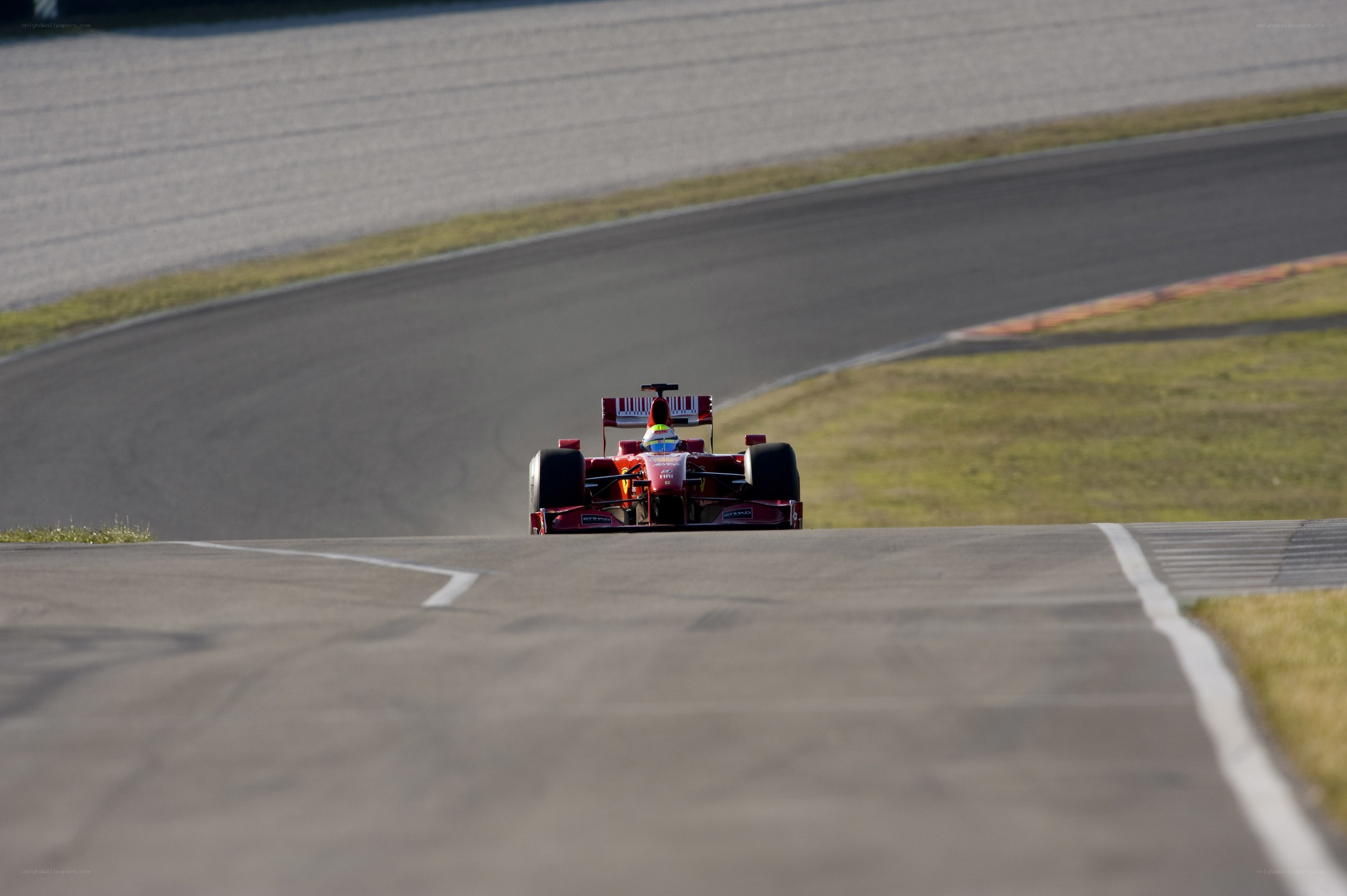 Red race car on track